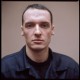 Алексей Ощепков. Осужден на пожизненное заключение за убийство, которого он не совершал. Пытая, милиционеры отрезали ему мочки ушей.